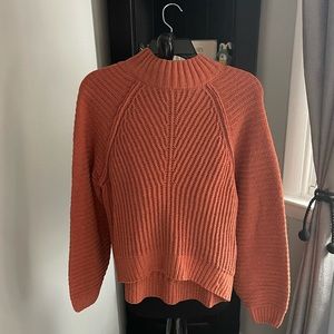 Soft sweater , clay colored , high bottom, longer in back